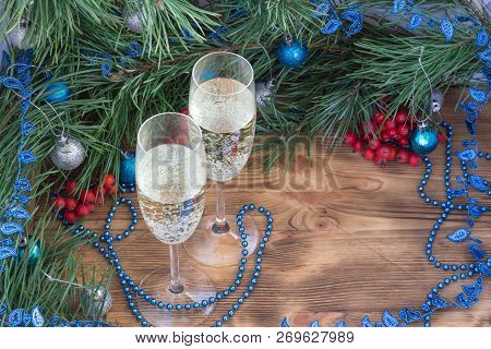 Christmas And New Year Still Life Composition With Two Champaign Glasses, Pine Tree Acerose, Red Row
