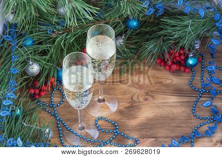 Christmas And New Year Still Life Composition With Two Champaign Glasses, Pine Tree Acerose, Red Row
