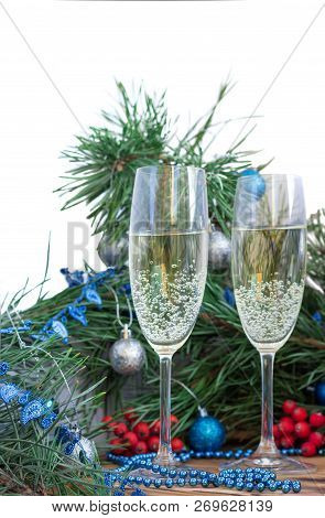 Christmas And New Year Still Life Composition With Two Champaign Glasses, Pine Tree Acerose, Red Row
