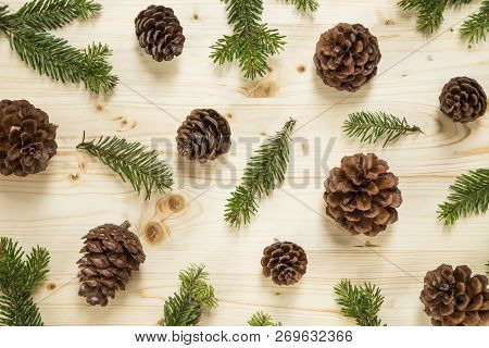 Holiday Background With The Pine Cones On Pine Wood Background