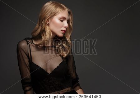 Fashion Model With Long Hair, Perfect Skin Is Posing In Studio For Glamour Test Photo Shoot Showing 