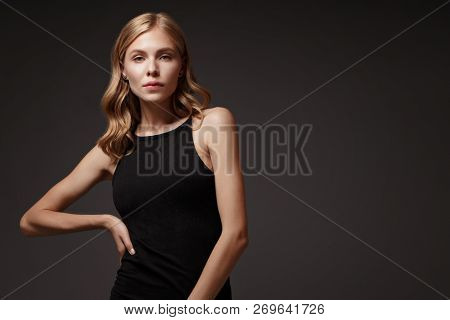 Fashion Model With Long Hair, Perfect Skin Is Posing In Studio For Glamour Test Photo Shoot Showing 