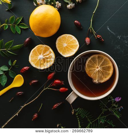 Rosehip Herbal Tea Flt Lay Top View With Slice Of Lemon On Wooden Table