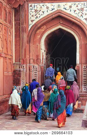 Group Of People Walking At Taj Mahal Complex In Agra, Uttar Pradesh, India. Taj Mahal Was Designated