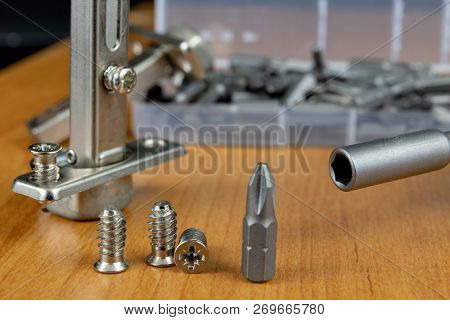 Installation Of Chipboard Furniture In A Carpentry Workshop. Accessories And Tools For Carpenters.