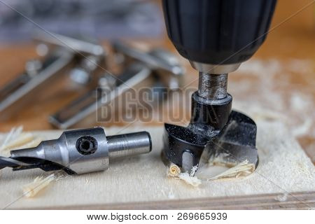 Installation Of Chipboard Furniture In A Carpentry Workshop. Accessories And Tools For Carpenters.