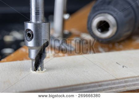 Installation Of Chipboard Furniture In A Carpentry Workshop. Accessories And Tools For Carpenters.