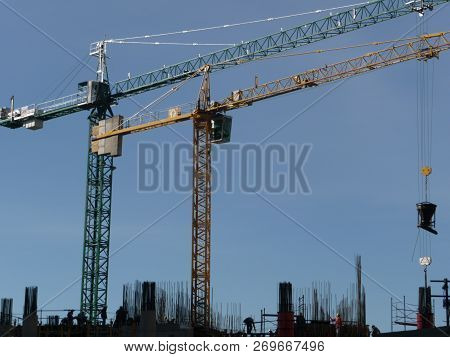 Couple Of Construction Cranes At Buenos Aires