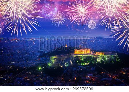 Cityscape Of Athens With Illuminated Acropolis Hill And Pathenon Temple At Night With Fireworks, Gre
