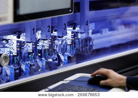 Engineer Controls The Operation Of The Computer-aided Industrial Machine. Selective Focus.