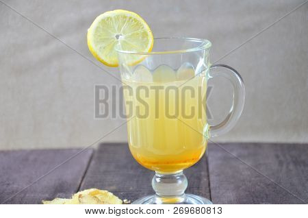 Hot Drink With Honey, Lemon, Honey And Ginger For Cough Remedy On Wooden Table, Healthy Drink. Hot W