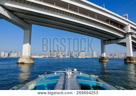Rainbow Bridge And Cityscape In Tokyo, Japan