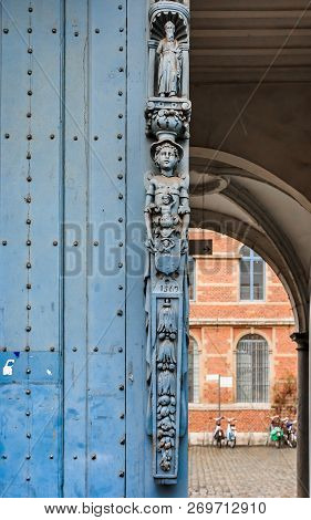 Ornate Medieval Wooden Door Detail With Year 1596 Carved In It, Leuven, Belgium