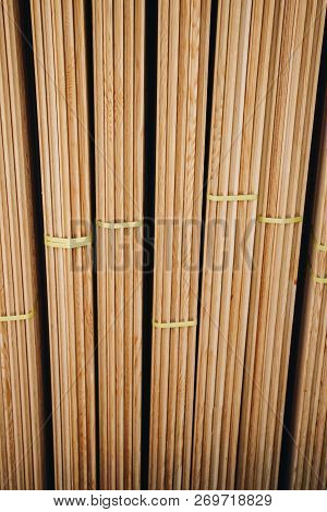 Large Rectanguler Wood Panels Stacked Up Together In Display