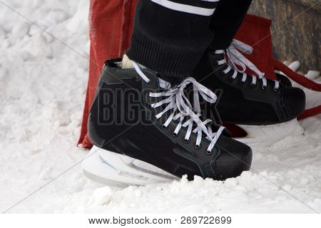 Men's Hockey Skates On A White Background .