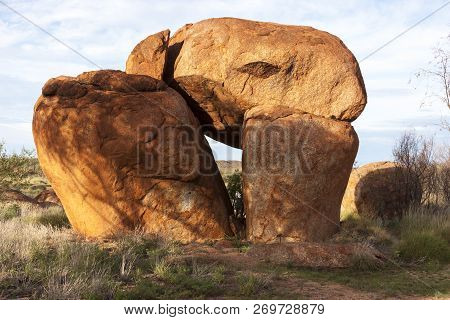 Devils Marbles Are Huge Granite Boulders Scattered Across A Wide, Shallow Valley, 100 Kilometers Sou