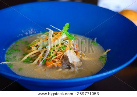 Ginseng Oxtail Soup Herb Boiled Oxtail With Ginseng Served With Mixed Vegetables And Bun