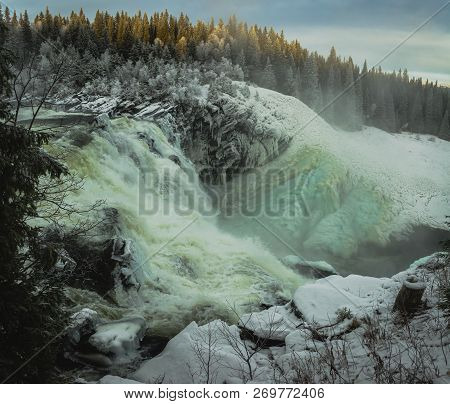 Biggest Frozen Swedish Waterfall Tannforsen In Winter Time