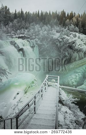 Biggest Frozen Swedish Waterfall Tannforsen In Winter Time