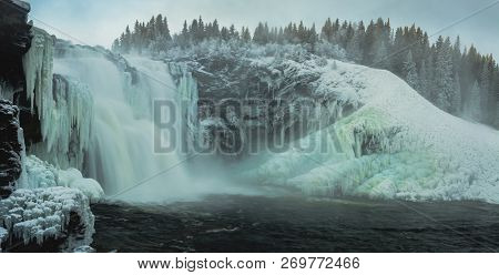 Biggest Frozen Swedish Waterfall Tannforsen In Winter Time