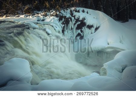 Biggest Frozen Swedish Waterfall Tannforsen In Winter Time