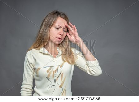 Emotional Woman Holding Hand On Forehead, Feeling Bad And Sick. She Having Headache And Fever. Portr