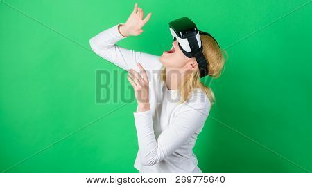 Excited Smiling Businesswoman Wearing Virtual Reality Glasses. Pretty Woman Playing Game In Virtual 