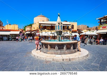 Rhodes, Greece - May 13, 2018: Hippocrates Fountain At The Rhodes Old Town Main Square In Rhodes Isl