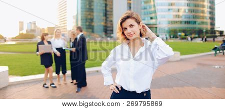 Business Lady With Close Up Face Looking At Camera In   And Empl