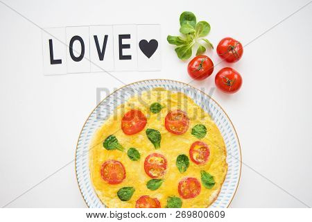 Home Classic Omelette With Cherry Tomatoes And Basil, Inscription Love-close-up.