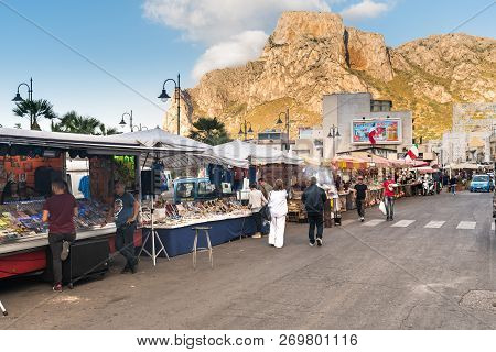 Sferracavallo, Sicily, Italy - October 1, 2018: View Of Main Street With Outside Market At Afternoon