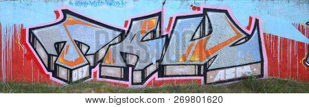 Full And Acomplished Graffiti Artwork. The Old Wall Decorated With Paint Stains In The Style Of Stre