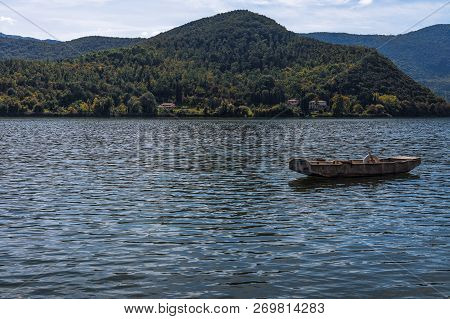 Beautiful View Of The Lake Piediluco With A Boat And The Umbria Hills In The Background. Umbria, Ita