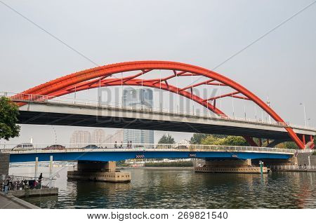 Tianjin, China - 21 October 2018: Jingang Bridge And Tientsin Eye Ferris Wheel In Tianjin