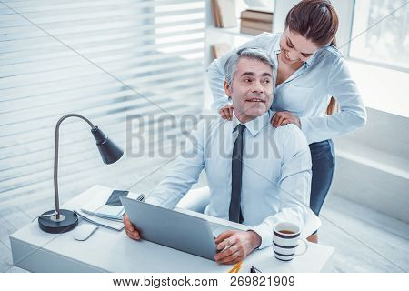 Happy Surprised Boss Receiving A Massage From His Secretary