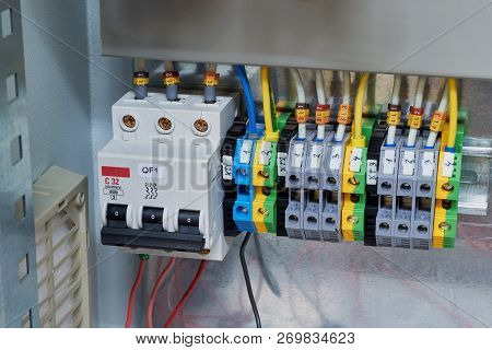 Modular Circuit Breaker And A Number Of Terminals In The Electrical Cabinet. Electrical Wires Or Cab