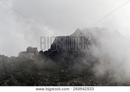 Mountains With Clouds In The Restonica Valley In Corsica