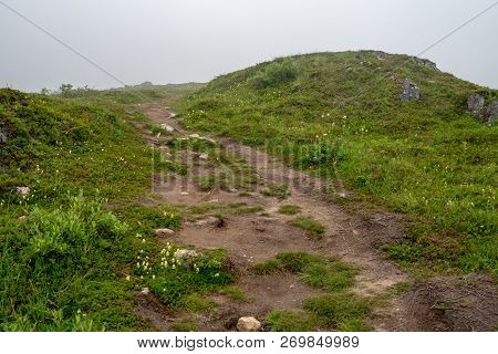 Spooky Trail In The Ghost Town Of Independence Mine Alaska At Hatcher Pass On A Misty Foggy Day