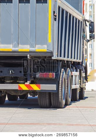 Big Dump Truck Goes  On Highway Photo