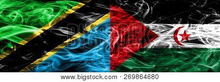 Tanzania Vs Sahrawi Smoke Flags Placed Side By Side. Thick Colored Silky Smoke Flags Of Tanzanian An