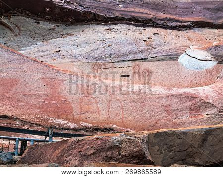 The Painting On Stone Wall Be Prehistoric Drawing Age About 3,000 Year, At Patam Of Thailand