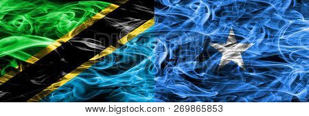 Tanzania Vs Somalia, Somalian Smoke Flags Placed Side By Side. Thick Colored Silky Smoke Flags Of Ta