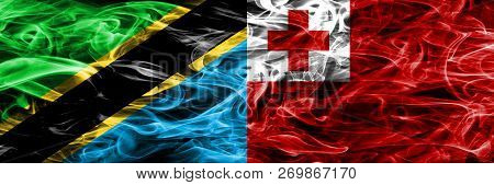 Tanzania Vs Tonga, Tongan Smoke Flags Placed Side By Side. Thick Colored Silky Smoke Flags Of Tanzan