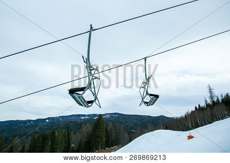 Winter Mountains Panorama With Ski Slopes And Ski Lifts. Alps. Austria.