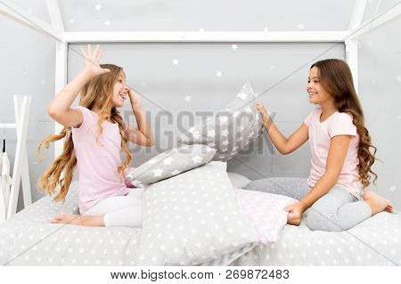 Soulmates Girls Having Fun Sleepover Party. Girls Happy Friends With Cute Pillows. Pillow Fight Paja