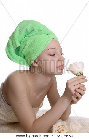 Young woman enjoying the rose