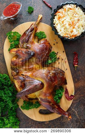 Whole Baked Flattened Chicken With A Golden Crispy Crust. 
