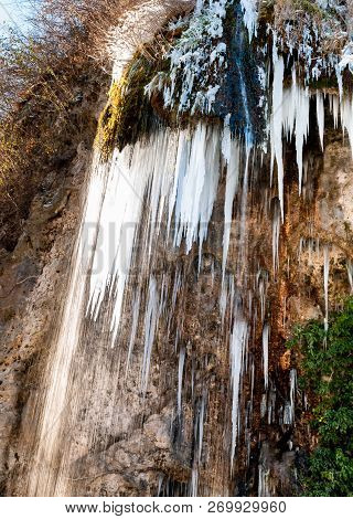Stalactites in the Caves of Valganna in frosty winter day, province of Varese, Italy