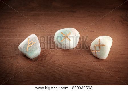 A Closeup Of Ancient Norse Runes From The Futhark Alphabet, Stones With Symbols Used In Wicca And Ot
