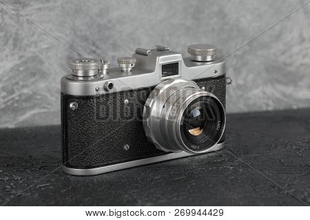 Moscow, Russia, February 06, 2018. The Old Film Camera Zarya, Brown Body, Released1961 On The Backgr